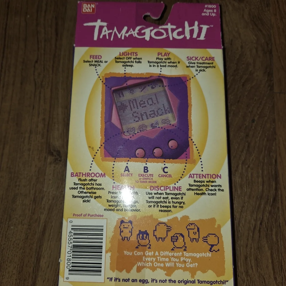 1996-97 Bandai Tamagotchi Virtual Reality Pet #1800 Red w/Yellow Buttons NOS - Picture 4 of 4